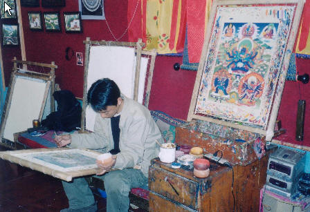 西藏圖片：畫唐卡的小伙子